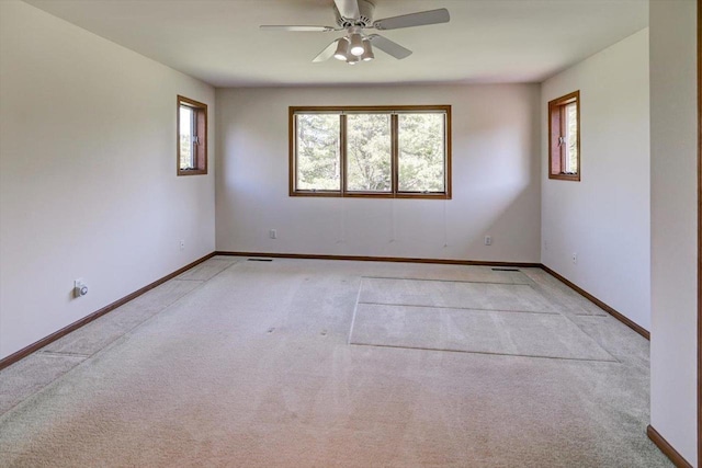 6460 Shady Bend Rd, Verona, WI 53593 - empty room featuring light colored carpet, a ceiling fan, and baseboards