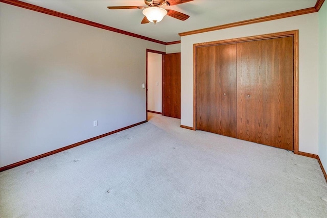 6460 Shady Bend Rd, Verona, WI 53593 - unfurnished bedroom with carpet flooring, a closet, baseboards, ornamental molding, and ceiling fan