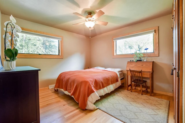 5102 Marathon Dr, Madison, WI 53705 - bedroom with light wood finished floors, baseboards, and a ceiling fan
