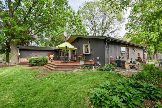 5102 Marathon Dr, Madison, WI 53705 - back of property with a wooden deck