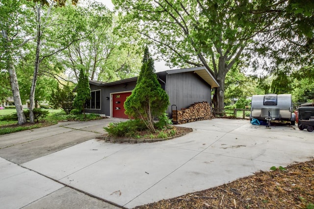 5102 Marathon Dr, Madison, WI 53705 - view of front of home featuring concrete driveway and a garage