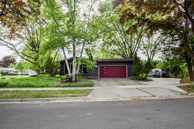 5102 Marathon Dr, Madison, WI 53705 - view of front of home with driveway and an attached garage