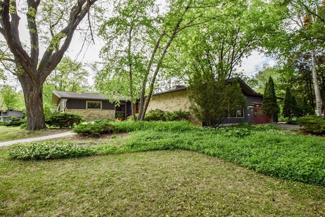 5102 Marathon Dr, Madison, WI 53705 - view of front of property with brick siding and a front lawn