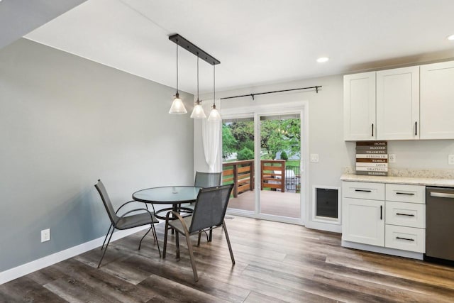 1902 Winfield Dr, Reedsburg, WI 53959 - dining room with dark wood-type flooring, recessed lighting, and baseboards