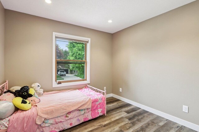 1902 Winfield Dr, Reedsburg, WI 53959 - bedroom with recessed lighting, wood finished floors, and baseboards
