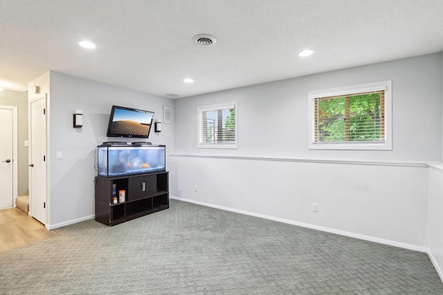 1902 Winfield Dr, Reedsburg, WI 53959 - unfurnished living room featuring recessed lighting, baseboards, and carpet floors