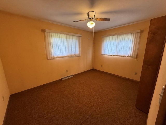W12574 US Highway 45, Marion, WI 54950 - empty room with ceiling fan, dark colored carpet, baseboards, and crown molding