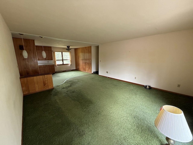 W12574 US Highway 45, Marion, WI 54950 - unfurnished living room featuring carpet flooring, baseboards, and ceiling fan
