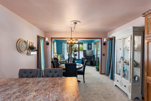N3154 River Bend Dr, Peshtigo, WI 54157 - dining space featuring light colored carpet and a chandelier
