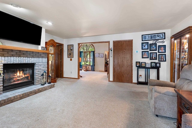 N3154 River Bend Dr, Peshtigo, WI 54157 - carpeted living room with a brick fireplace and baseboards