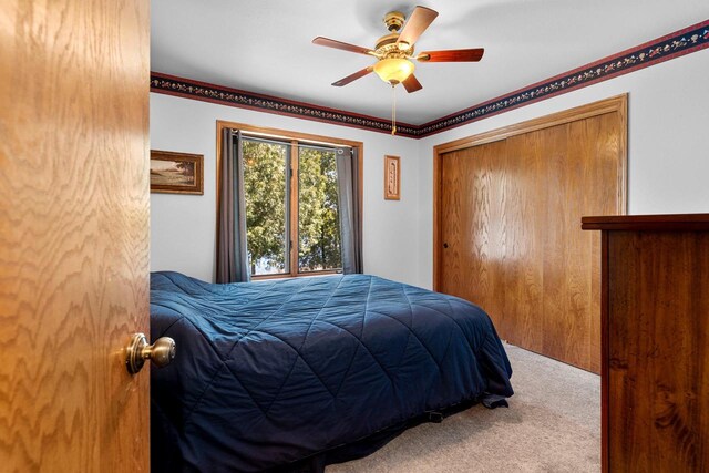 N3154 River Bend Dr, Peshtigo, WI 54157 - bedroom featuring carpet flooring, a closet, and ceiling fan