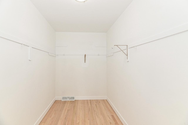 9530 W Debbie Ln, Milwaukee, WI 53224 - spacious closet with light wood finished floors