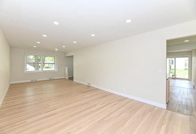 9530 W Debbie Ln, Milwaukee, WI 53224 - spare room with light wood finished floors, recessed lighting, and baseboards