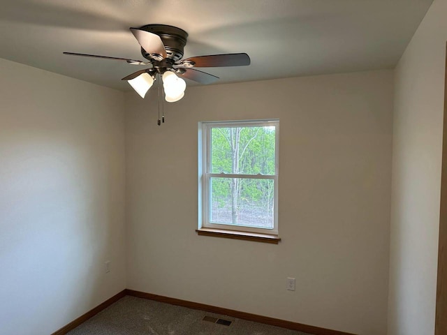 513 Oak Grove Dr, Necedah, WI 54646 - carpeted empty room featuring baseboards and a ceiling fan