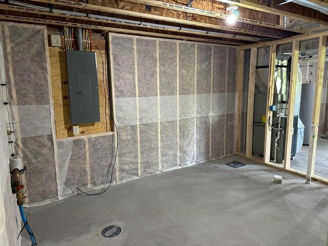 513 Oak Grove Dr, Necedah, WI 54646 - unfinished below grade area featuring electric panel and water heater