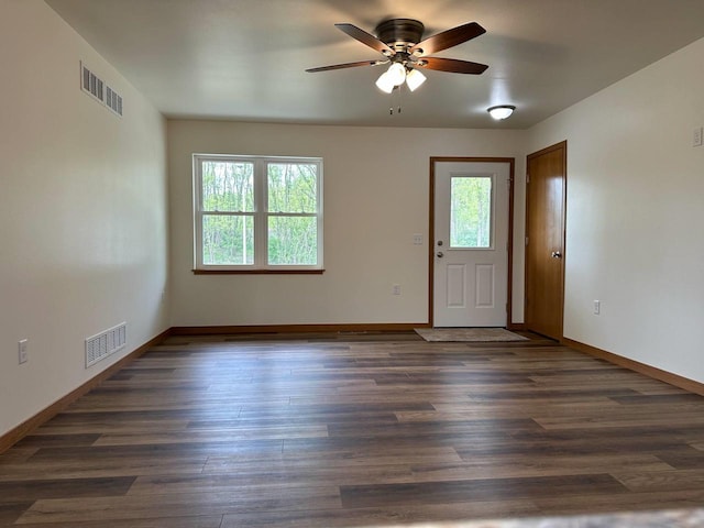 513 Oak Grove Dr, Necedah, WI 54646 - entrance foyer featuring ceiling fan, baseboards, and dark wood-style flooring