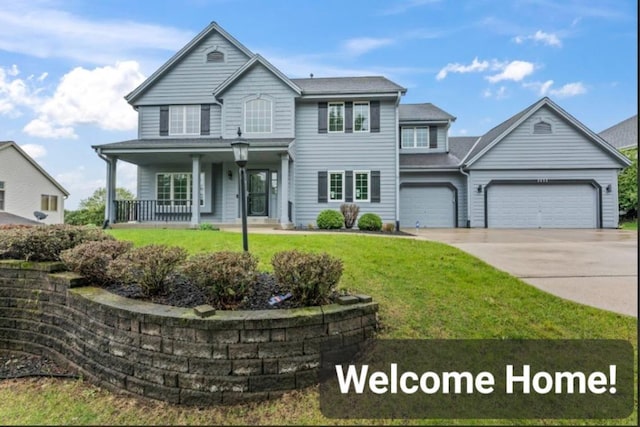 2605 River Ridge Drive, Waukesha, WI 53189 - traditional home featuring covered porch, concrete driveway, a garage, and a front yard