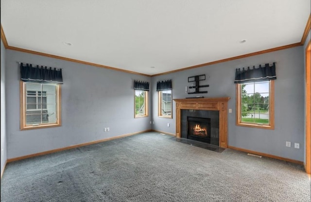 2605 River Ridge Drive, Waukesha, WI 53189 - unfurnished living room featuring crown molding, baseboards, healthy amount of natural light, carpet floors, and a tile fireplace