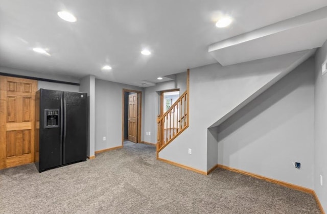 2605 River Ridge Drive, Waukesha, WI 53189 - unfurnished living room featuring light carpet, baseboards, recessed lighting, and stairs