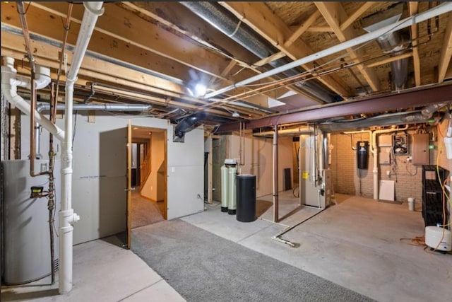 2605 River Ridge Drive, Waukesha, WI 53189 - unfinished below grade area with a central vacuum unit, heating unit, electric panel, a water softener system, and water heater