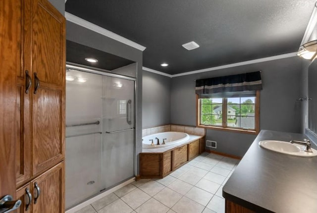 2605 River Ridge Drive, Waukesha, WI 53189 - full bath featuring a shower stall, ornamental molding, a garden tub, tile patterned flooring, and vanity