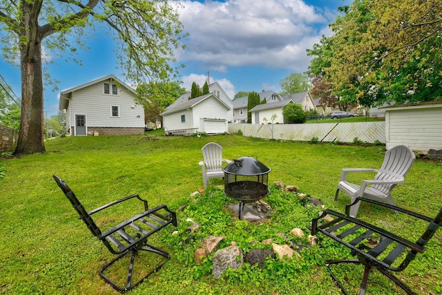320 Frederick St, Waukesha, WI 53186 - view of yard with an outdoor fire pit and an outdoor structure