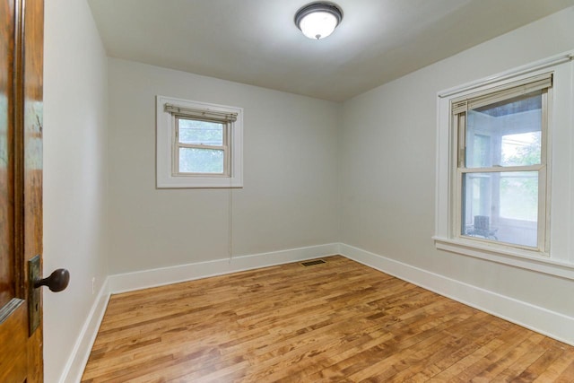 320 Frederick St, Waukesha, WI 53186 - spare room featuring light wood-style flooring and baseboards