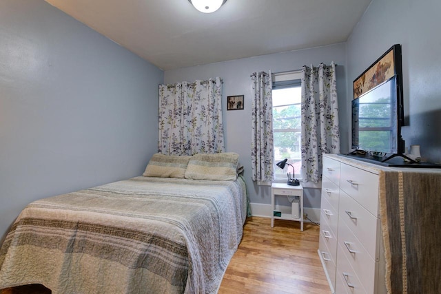 320 Frederick St, Waukesha, WI 53186 - bedroom featuring light wood-style floors and baseboards