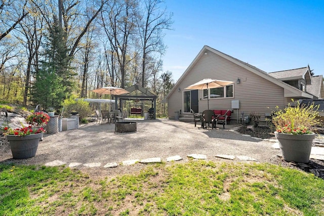 15393 Jacklin Heights Cir, Crivitz, WI 54114 - back of house with a gazebo and a patio area