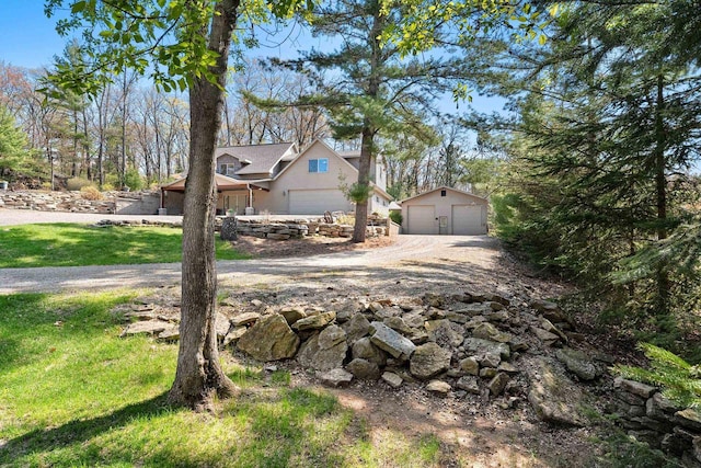 15393 Jacklin Heights Cir, Crivitz, WI 54114 - view of front facade featuring a detached garage and an outbuilding
