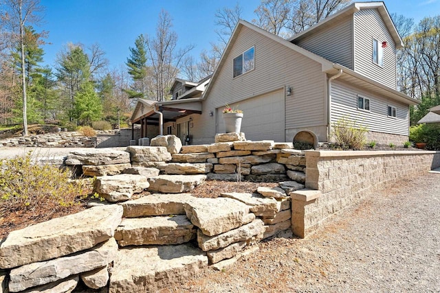15393 Jacklin Heights Cir, Crivitz, WI 54114 - view of side of home with an attached garage