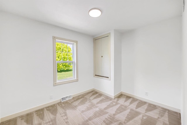 427 Robbins St, Seymour, WI 54165 - spare room with baseboards and light colored carpet