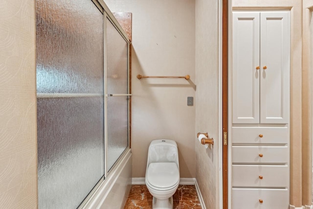 58 Oakridge Ct, Fond Du Lac, WI 54937 - bathroom with baseboards, shower / bath combination with glass door, and toilet