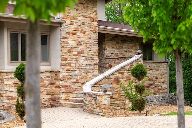 58 Oakridge Ct, Fond Du Lac, WI 54937 - entrance to property with stucco siding and stone siding