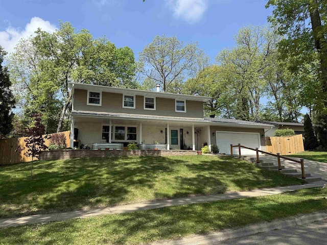 522 Valley Rd, Madison, WI 53714 - view of front facade with a porch and a garage