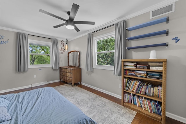 522 Valley Rd, Madison, WI 53714 - bedroom featuring ornamental molding, wood finished floors, baseboards, and a ceiling fan