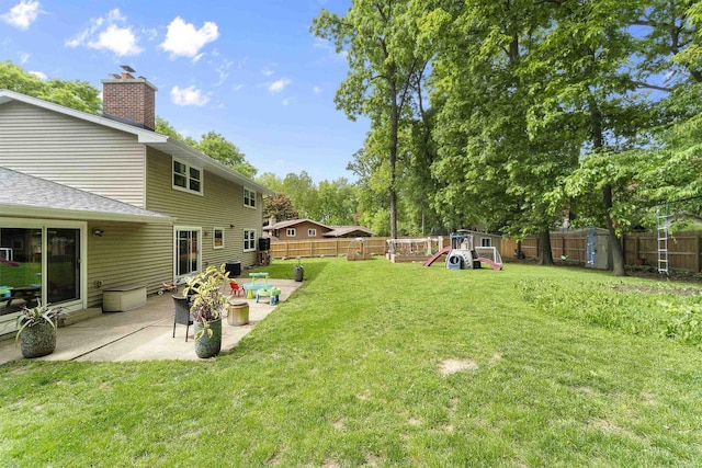 522 Valley Rd, Madison, WI 53714 - view of yard with a playground and a patio area