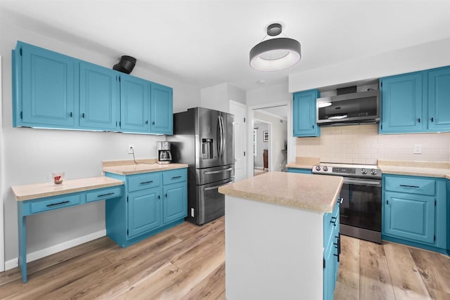 522 Valley Rd, Madison, WI 53714 - kitchen featuring stainless steel appliances, blue cabinets, and a kitchen island