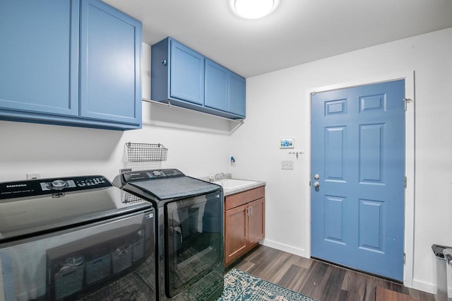 900 Edgewater Dr, Merrill, WI 54452 - laundry room with washer and dryer, dark wood finished floors, cabinet space, and baseboards