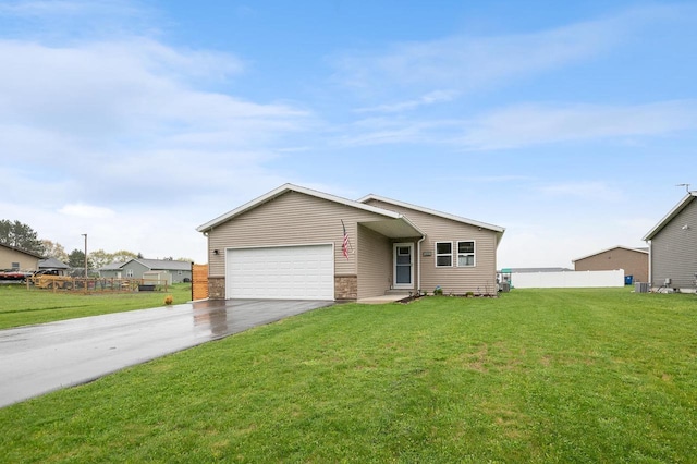 900 Edgewater Dr, Merrill, WI 54452 - ranch-style house with driveway and a garage