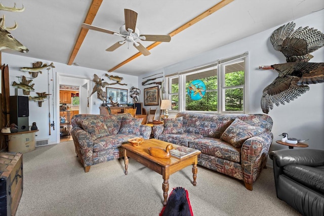 N8991 E Miramar Dr Unit N8993, East Troy, WI 53120 - living area featuring carpet flooring, beamed ceiling, and a ceiling fan