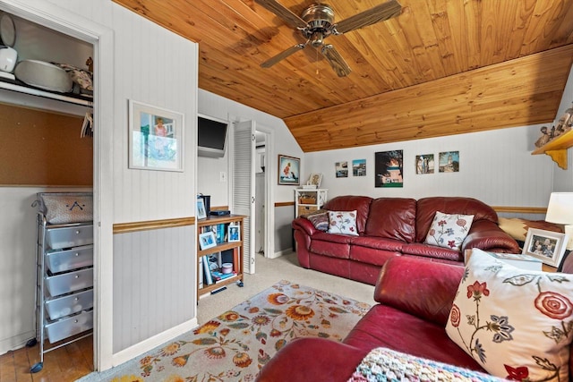 N8991 E Miramar Dr Unit N8993, East Troy, WI 53120 - living room featuring wooden ceiling, a ceiling fan, vaulted ceiling, wooden walls, and baseboards