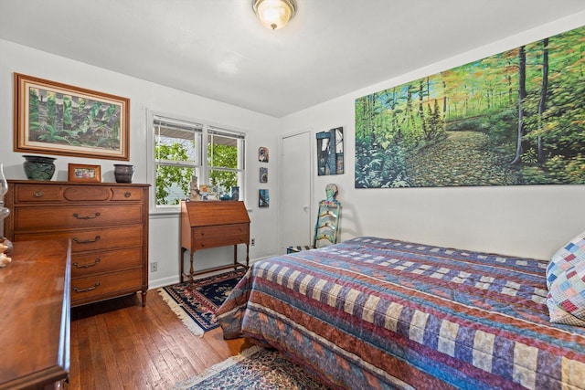 N8991 E Miramar Dr Unit N8993, East Troy, WI 53120 - bedroom with wood-type flooring and baseboards
