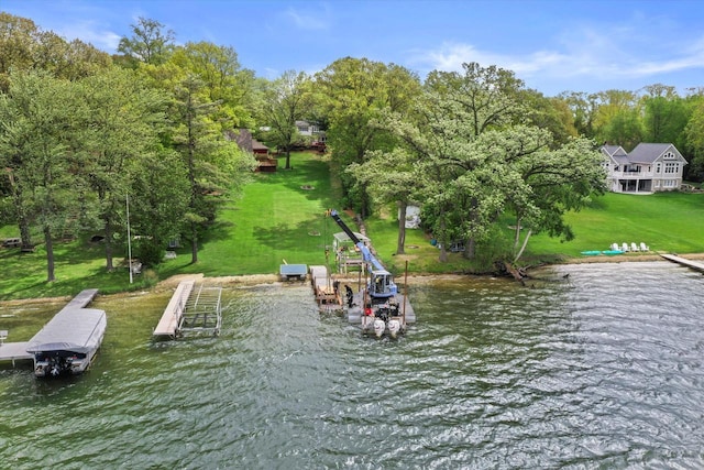 N8991 E Miramar Dr Unit N8993, East Troy, WI 53120 - dock with a water view, a yard, and view of wooded area