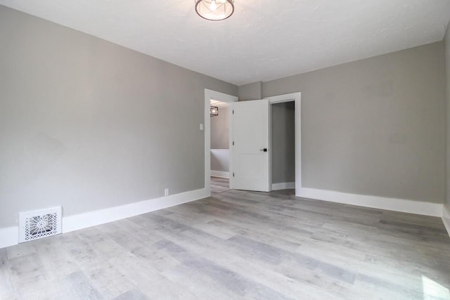 139 S Church St, Whitewater, WI 53190 - empty room with wood finished floors and baseboards