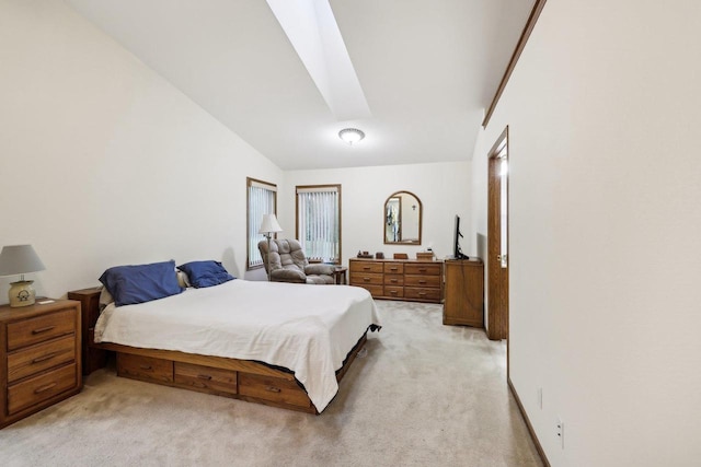 615 Jefferson St, Waterloo, WI 53594 - bedroom with light colored carpet, a skylight, and lofted ceiling