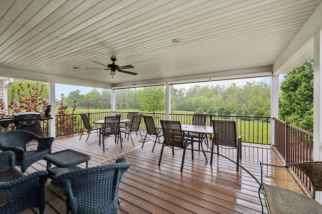 615 Jefferson St, Waterloo, WI 53594 - wooden terrace with outdoor dining space and a ceiling fan