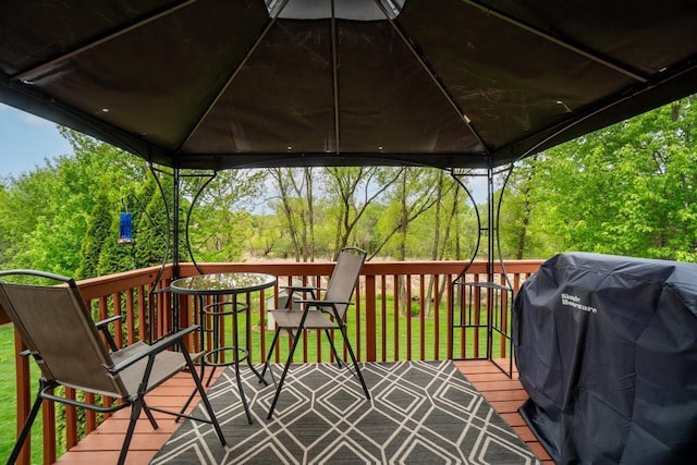 3829 Nicholas Dr, Menomonie, WI 54751 - wooden deck featuring a gazebo and area for grilling