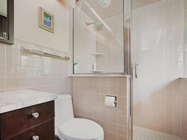 4701 4th St, Kenosha, WI 53144 - bathroom featuring tile walls, a shower stall, toilet, and vanity