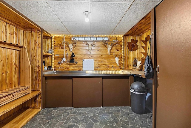 W6023 Lake Dr, Shawano, WI 54166 - indoor wet bar with wood walls and stone floors